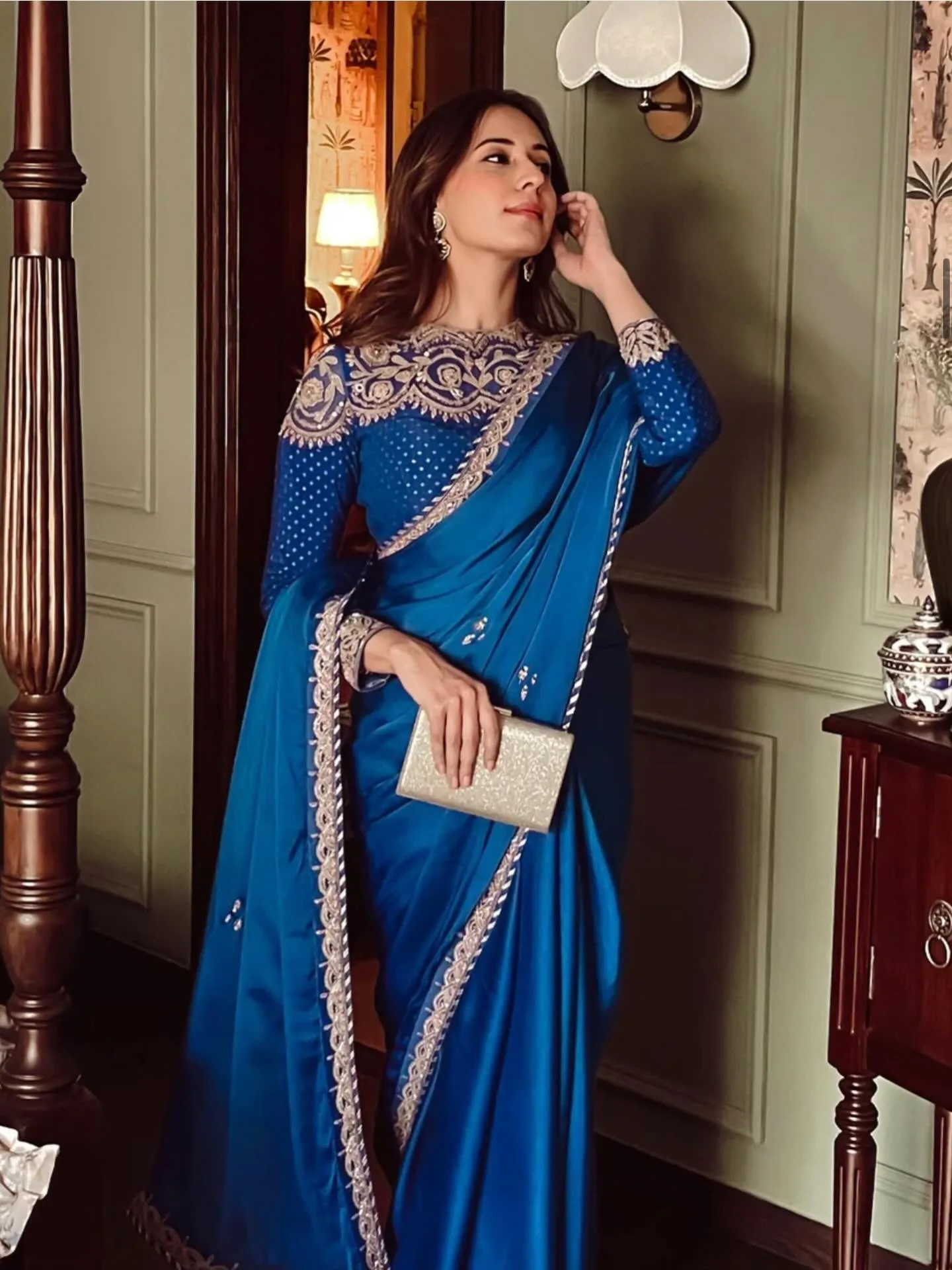 Red bridal lehenga with intricate zardosi embroidery and dupatta styling