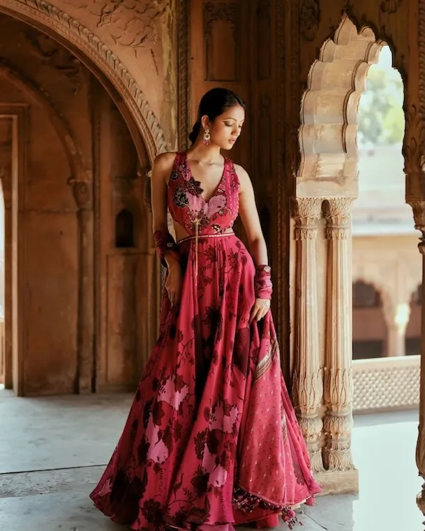 Women's party wear including anarkalis, sarees, and embroidered salwar suits